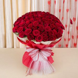 red roses hand bouquet
